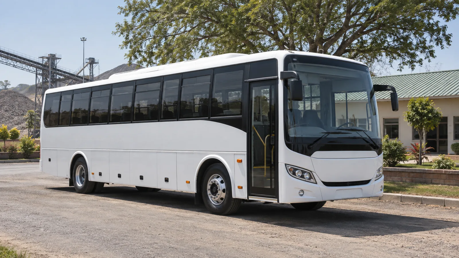 Passenger shuttle bus parked at an industrial site